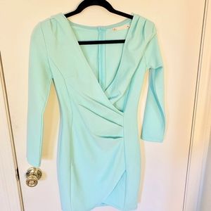 Plunging cyan bodycon dress